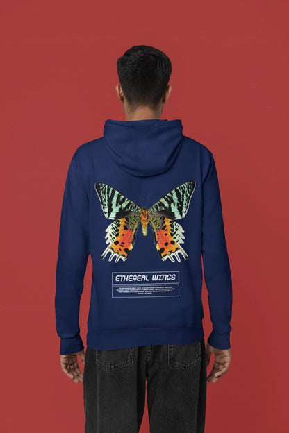 Back view of a male model wearing a navy blue hoodie with a glowing butterfly design, symbolizing the ethereal beauty of nature.