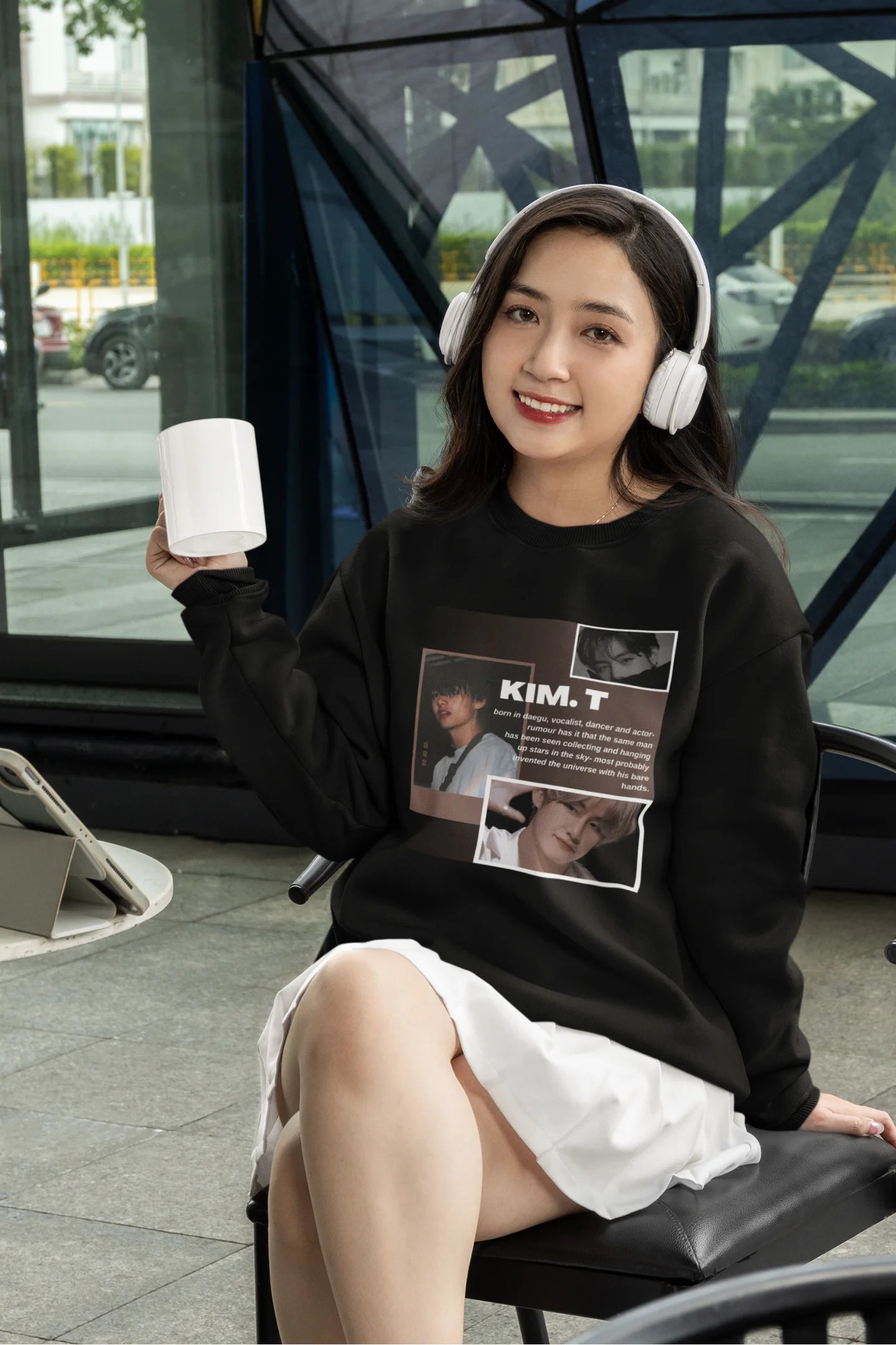 Third front view of female model wearing a black sweatshirt featuring a bold design inspired by BTS member Kim Taehyung (V). Ideal for BTS fans (ARMY) and K-Pop enthusiasts.