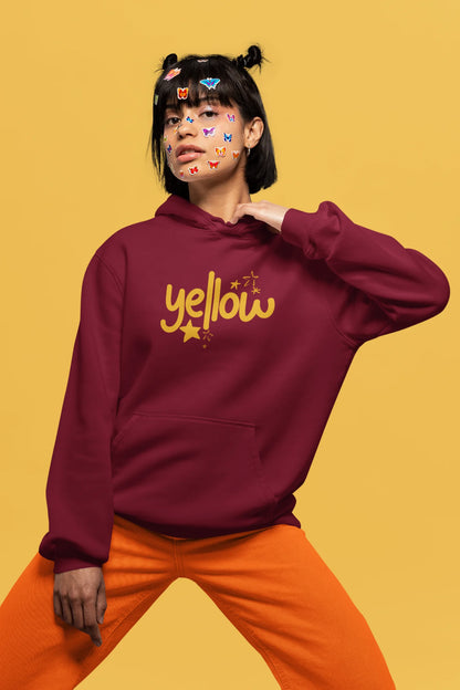 4th front view of a female model wearing a maroon hoodie with the "Yellow" album artwork by Coldplay.