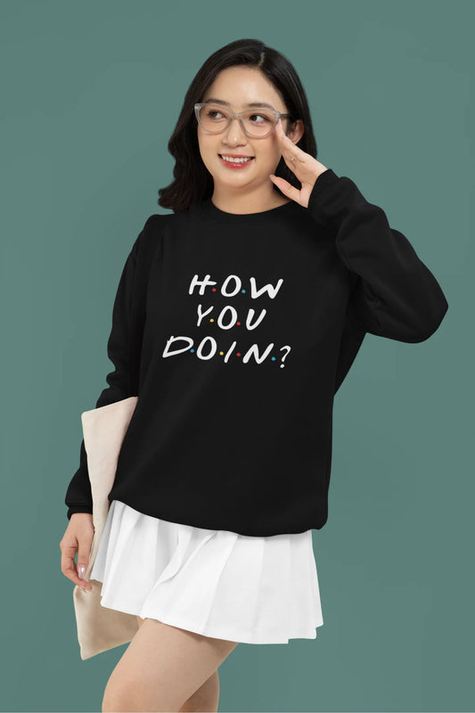 First image of female model wearing black sweatshirt with F.R.I.E.N.D.S series inspired designs, embodying Joey's famous catchphrase 'How You Doin'?