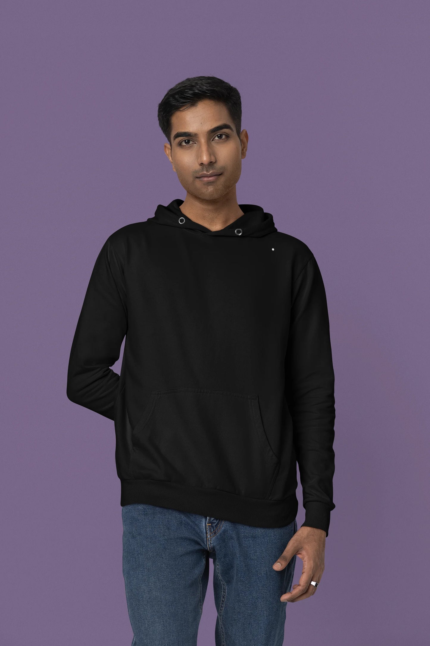 Second front view of a male model wearing a black hoodie with a Japanese art style tiger design.