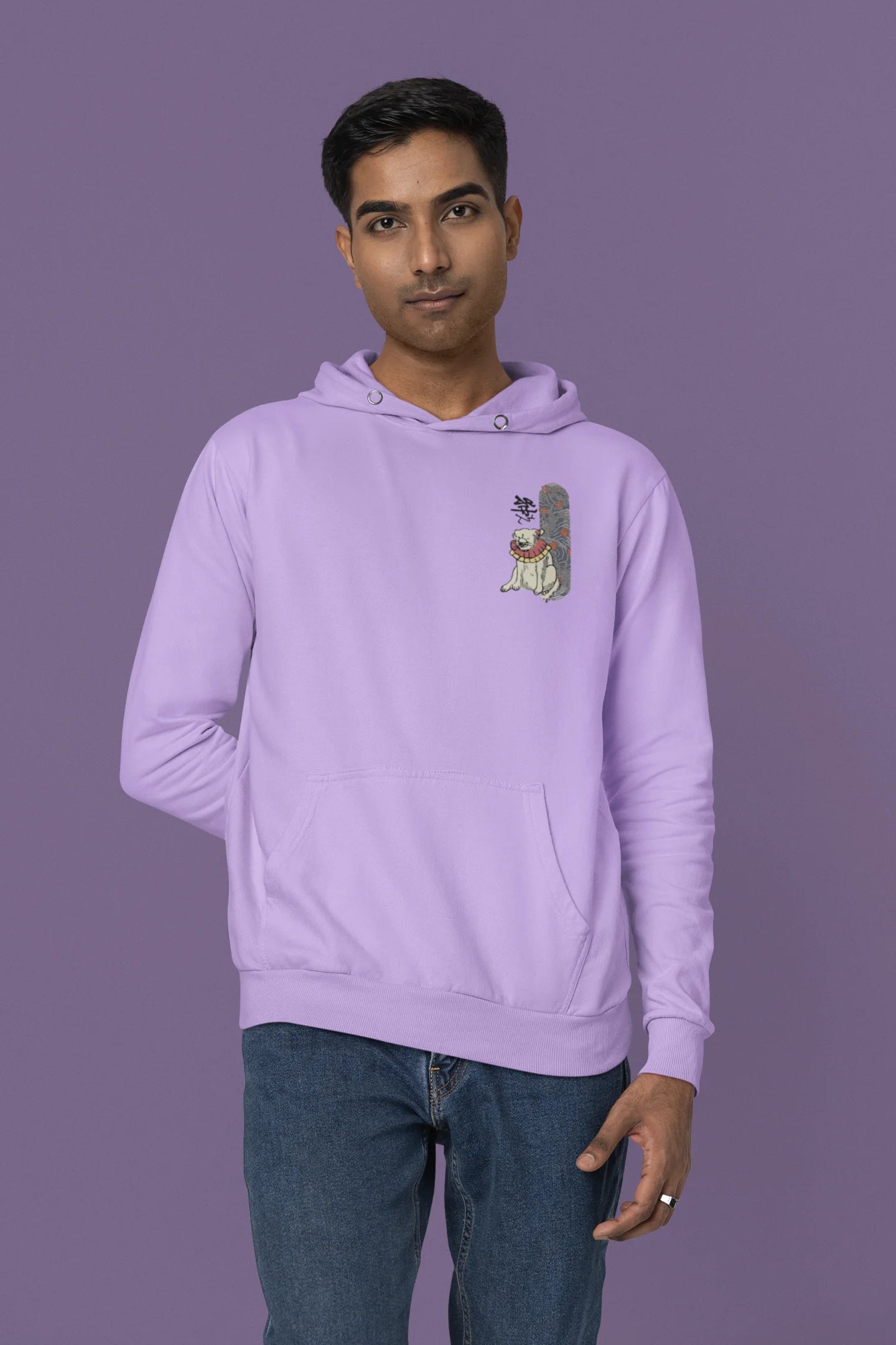 First front view of a male model wearing a lavender hoodie with a design of a mythical Japanese dog.