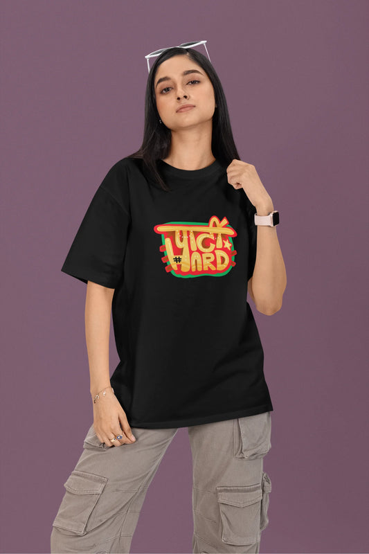 3rd front view of a female model wearing a black oversized t-shirt with the phrase "Party Hard" in an energetic Hindi.