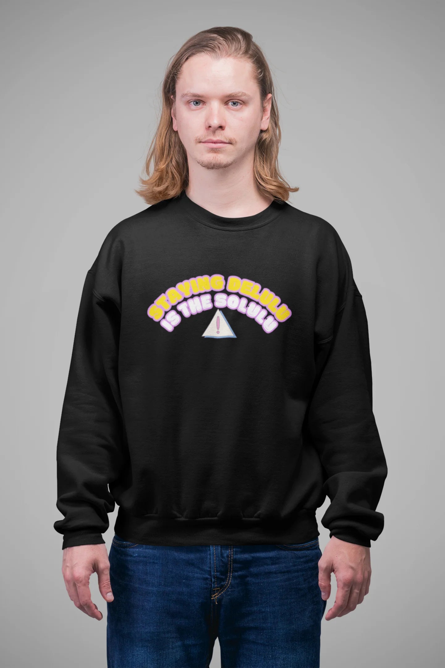 4th front view of male model wearing a black sweatshirt with the hilarious message "Stay Delulu" in a bold design. Ideal for those who love trendy slang and lighthearted humor.