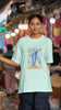 Third front image of female model wearing a mint green oversized t-shirt featuring the World Cup 2024 trophy with the text 