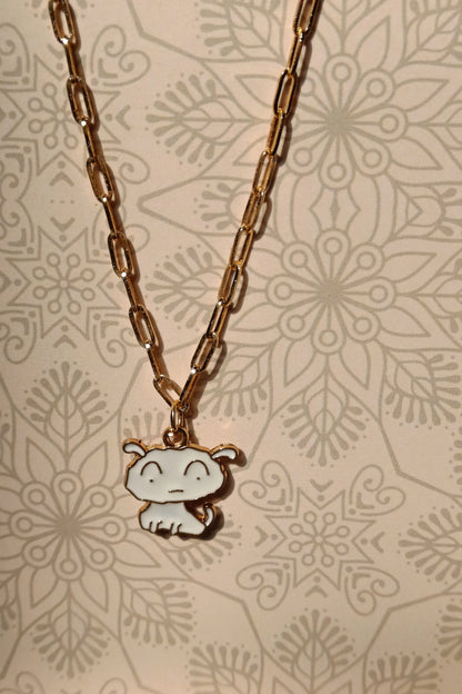 First view of a gold chain necklace with a small pendant depicting Shero from the anime Shin Chan.