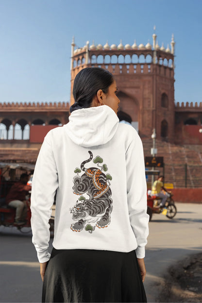 Back view of a female model wearing a white hoodie with a Japanese art style tiger design.