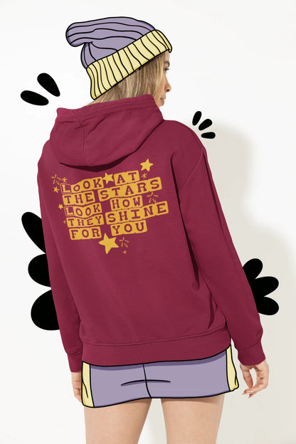 Back view of a female model wearing a maroon hoodie with the "Yellow" album artwork by Coldplay.