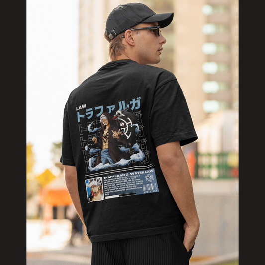 Back view of a male model wearing a black oversized t-shirt featuring Trafalgar Law from the One Piece anime.