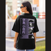 Back view of a female model wearing a black oversized t-shirt featuring Obanai Iguro from Demon Slayer: Kimetsu no Yaiba.