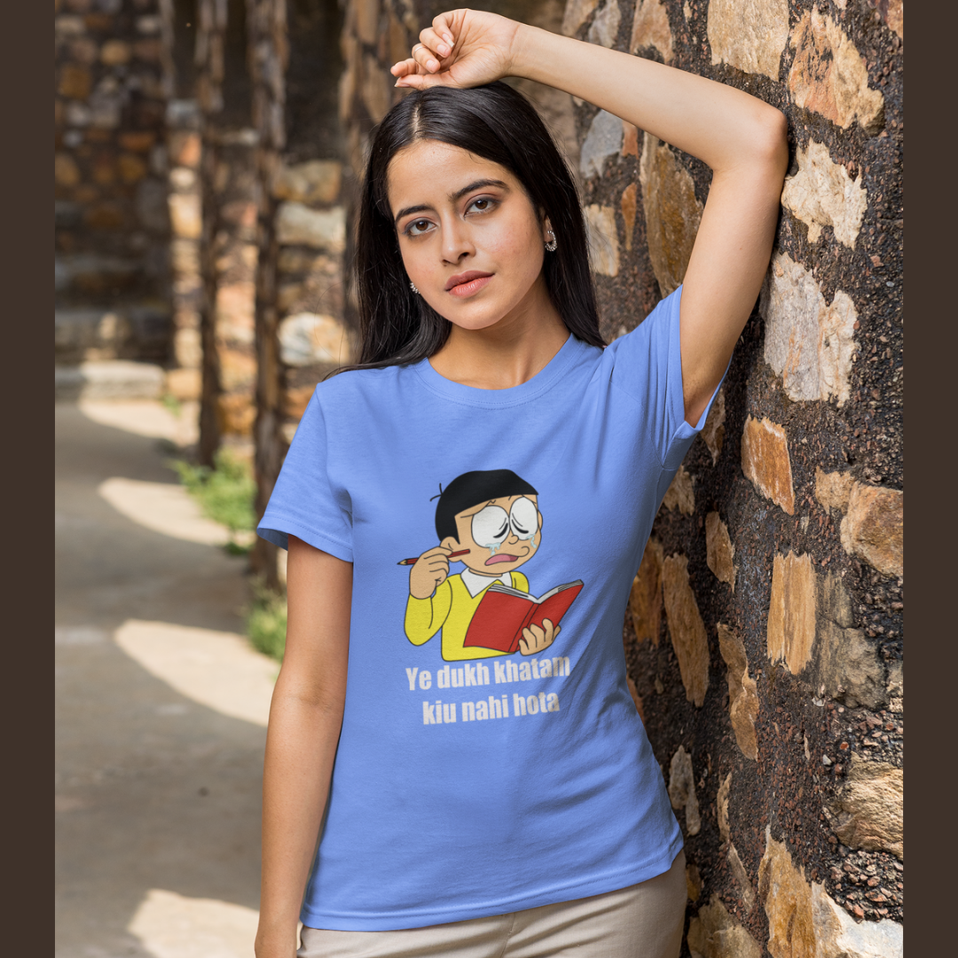 Front view of a female model wearing a sky-blue t-shirt featuring a funny Shinchan illustration from the Crayon Shinchan anime. Ideal for fans of the show and anyone who loves a good laugh.