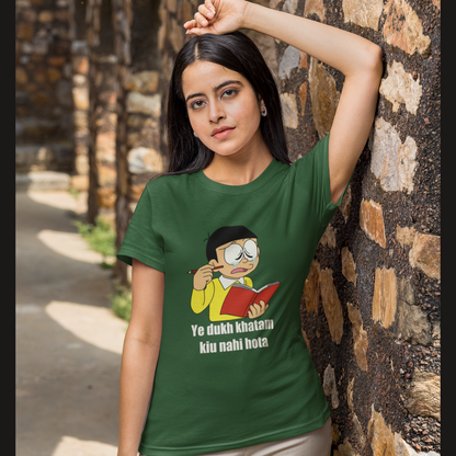 Front view of a female model wearing a bottle-green t-shirt featuring a funny Shinchan illustration from the Crayon Shinchan anime. Ideal for fans of the show and anyone who loves a good laugh.