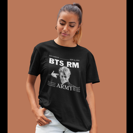 Front view of female model wearing a black oversized t-shirt featuring a design representing all seven members of BTS. Ideal for BTS fans (ARMY) who want to show their love for the entire group.