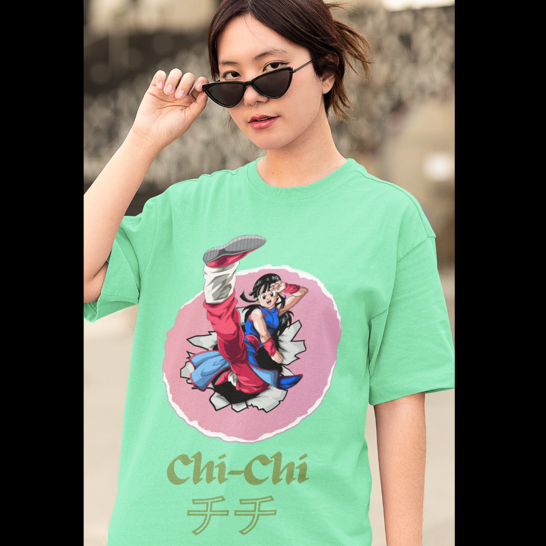 First front view of a female model wearing a mint green oversized t-shirt featuring Chi-Chi from Dragon Ball Z with the text "Chi-Chi."