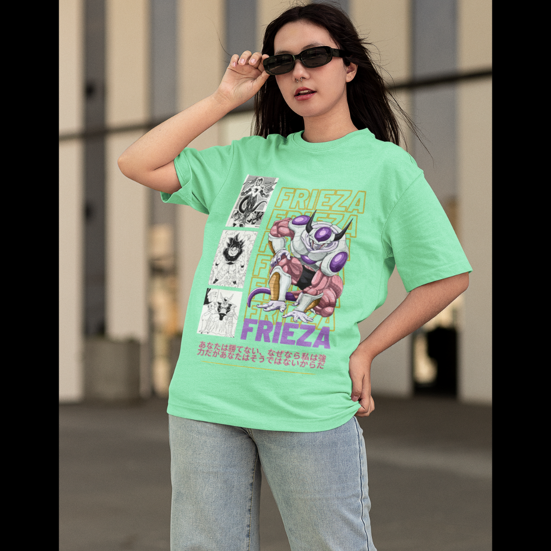 First front view of a female model wearing a mint green oversized t-shirt featuring Frieza from Dragon Ball Z with the text "Frieza."
