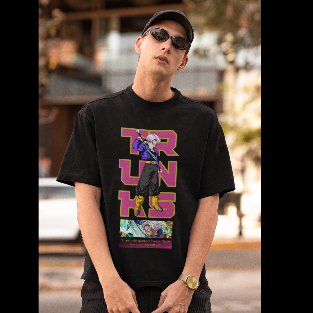 First front view of a male model wearing a black oversized t-shirt featuring Trunks from Dragon Ball Z with the text "Trunks."