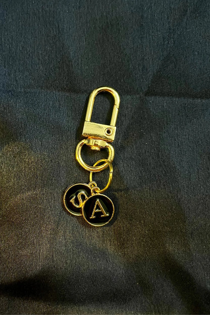 Fourth image of keychains featuring personalized initials for couples.