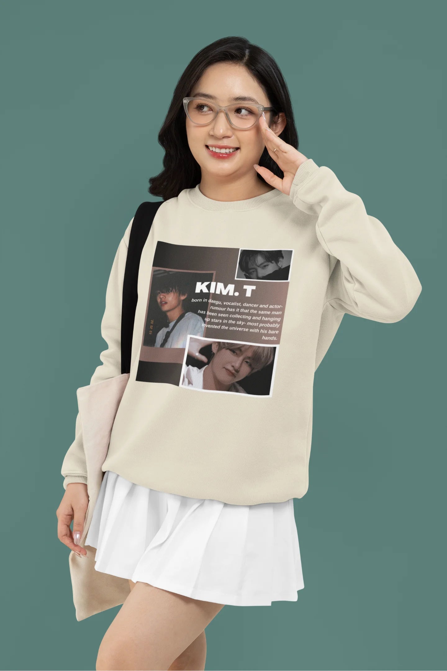 Third front view of female model wearing a cream sweatshirt featuring a bold design inspired by BTS member Kim Taehyung (V). Ideal for BTS fans (ARMY) and K-Pop enthusiasts.