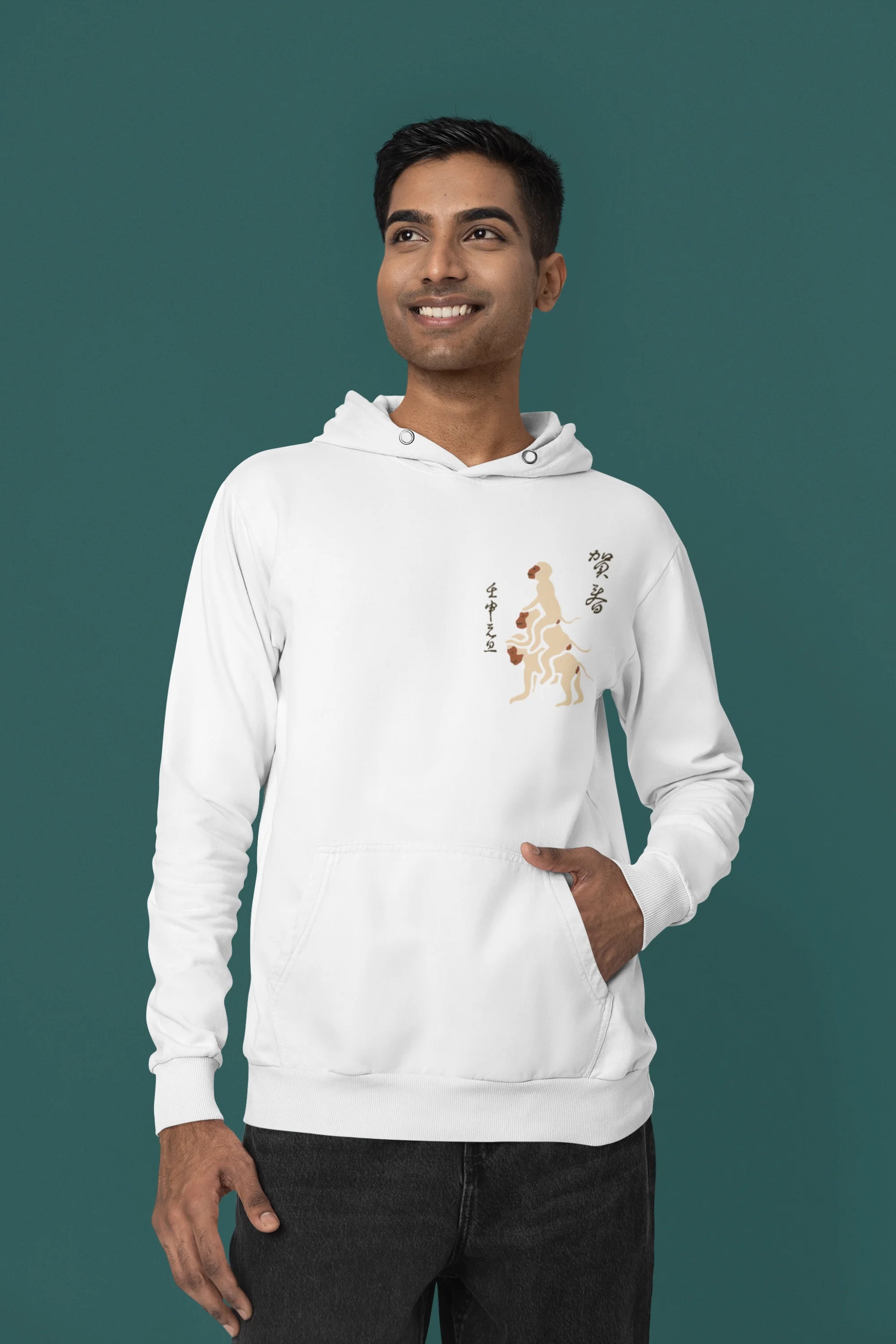 Second front view of a male model wearing a white hoodie with a design of the three wise monkeys: "See no evil, hear no evil, speak no evil."