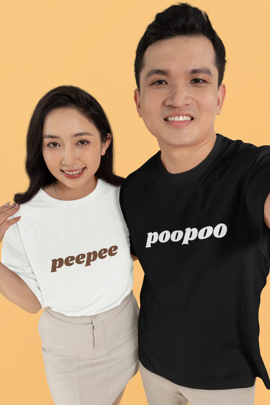 First front view of a couple wearing matching black and white oversize tees, one with the word "PeePee" and the other with the word "PooPoo".
