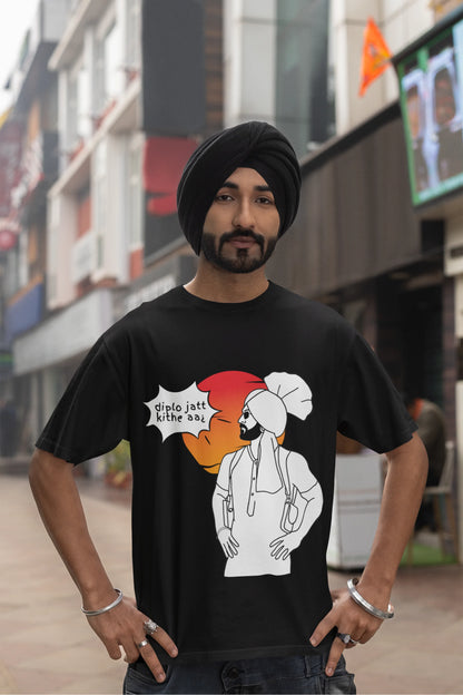 Third image of a male model wearing a black oversized tshirt with a A portrait of Diljit Dosanjh wearing a stylish outfit, with the text "Diplo Jatt Kithe Aai" prominently displayed in the background. The design captures the artist's charisma and the energy of the hit song, making it a must-have for fans of Diljit Dosanjh and Diplo alike. 