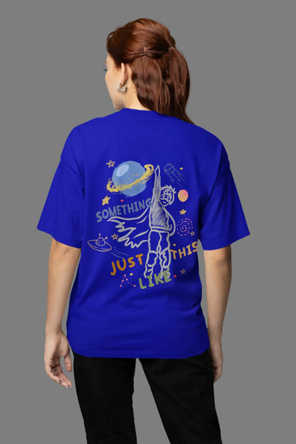 Back view of a female model wearing an royal blue oversized t-shirt with a design inspired by the "Something Just Like This" music video, featuring the word "Superheroes".