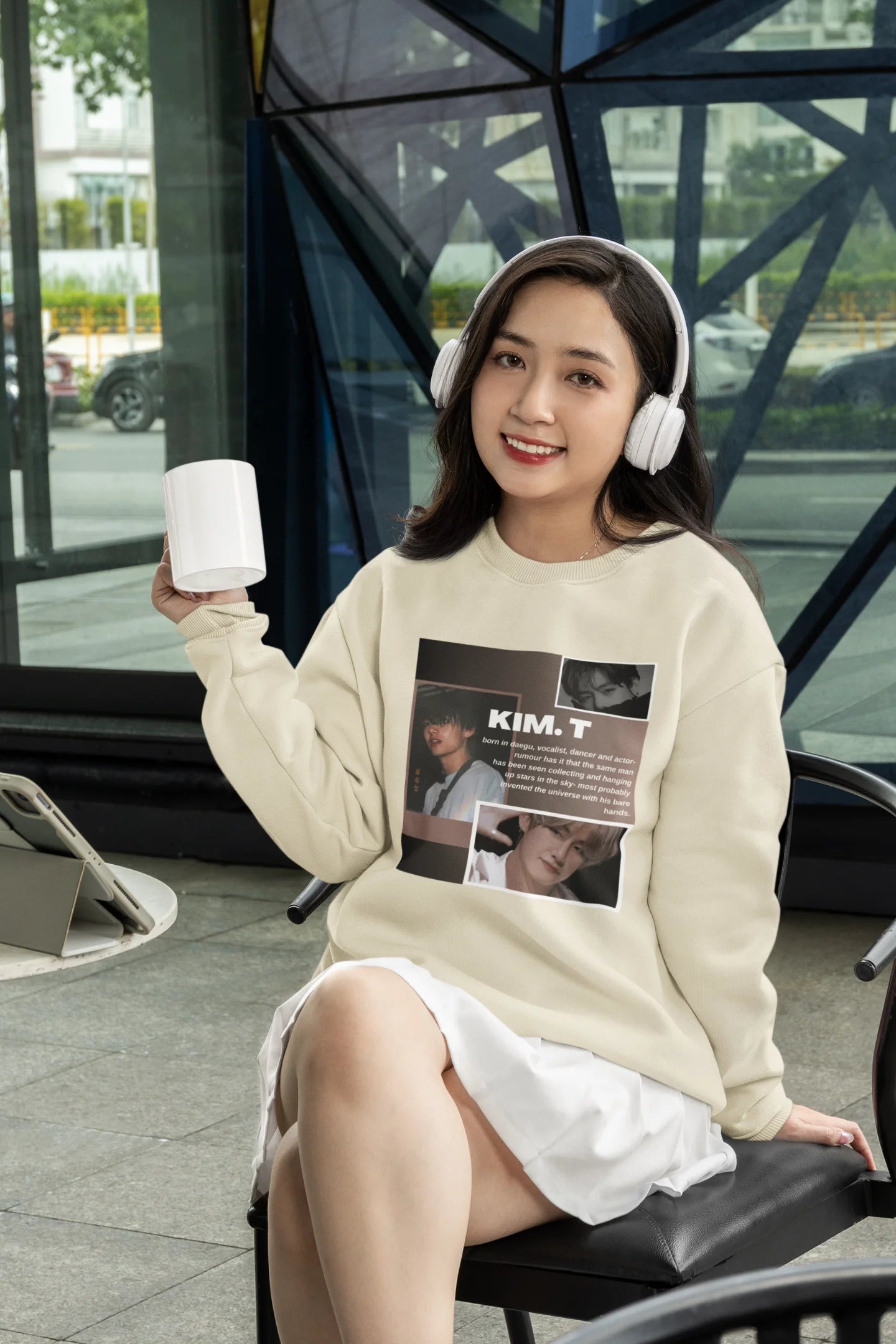 Second front view of female model wearing a cream sweatshirt featuring a bold design inspired by BTS member Kim Taehyung (V). Ideal for BTS fans (ARMY) and K-Pop enthusiasts.