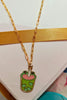 3rd view of a gold chain necklace featuring a small pendant of a frog themed boba cup.
