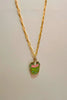 4th view of a gold chain necklace featuring a small pendant of a frog themed boba cup.