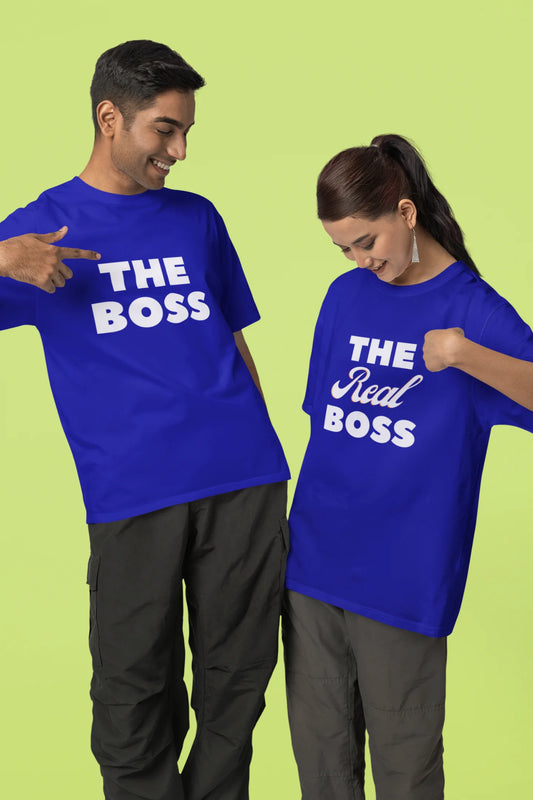 First image of a smiling couple wearing matching royal blue oversized tees, one with "The Boss" and the other with "The Real Boss" printed on them.