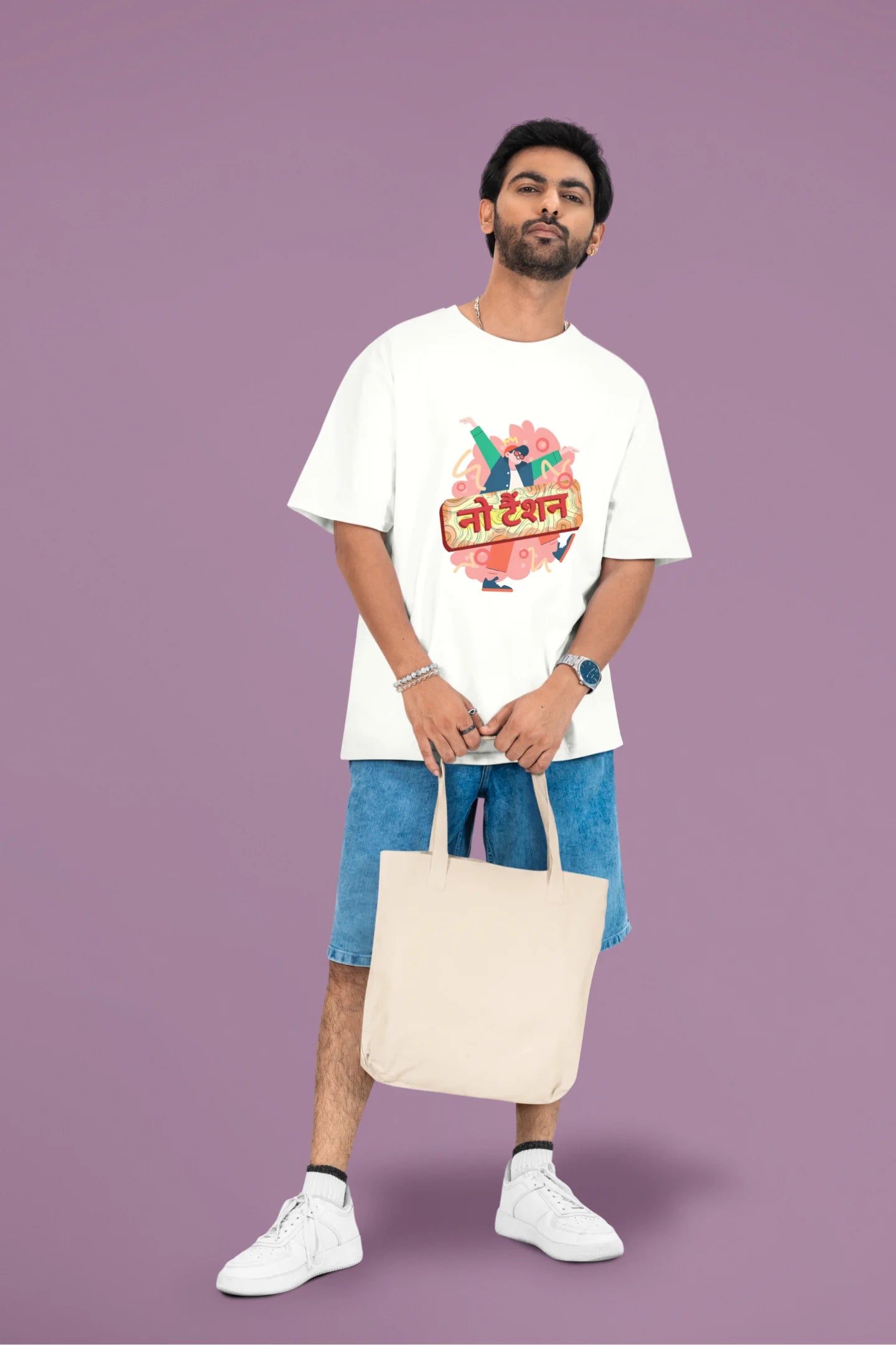 3rd front view of a male model wearing an off-white oversized t-shirt with the phrase "No Tension" in a relaxed, unique script.