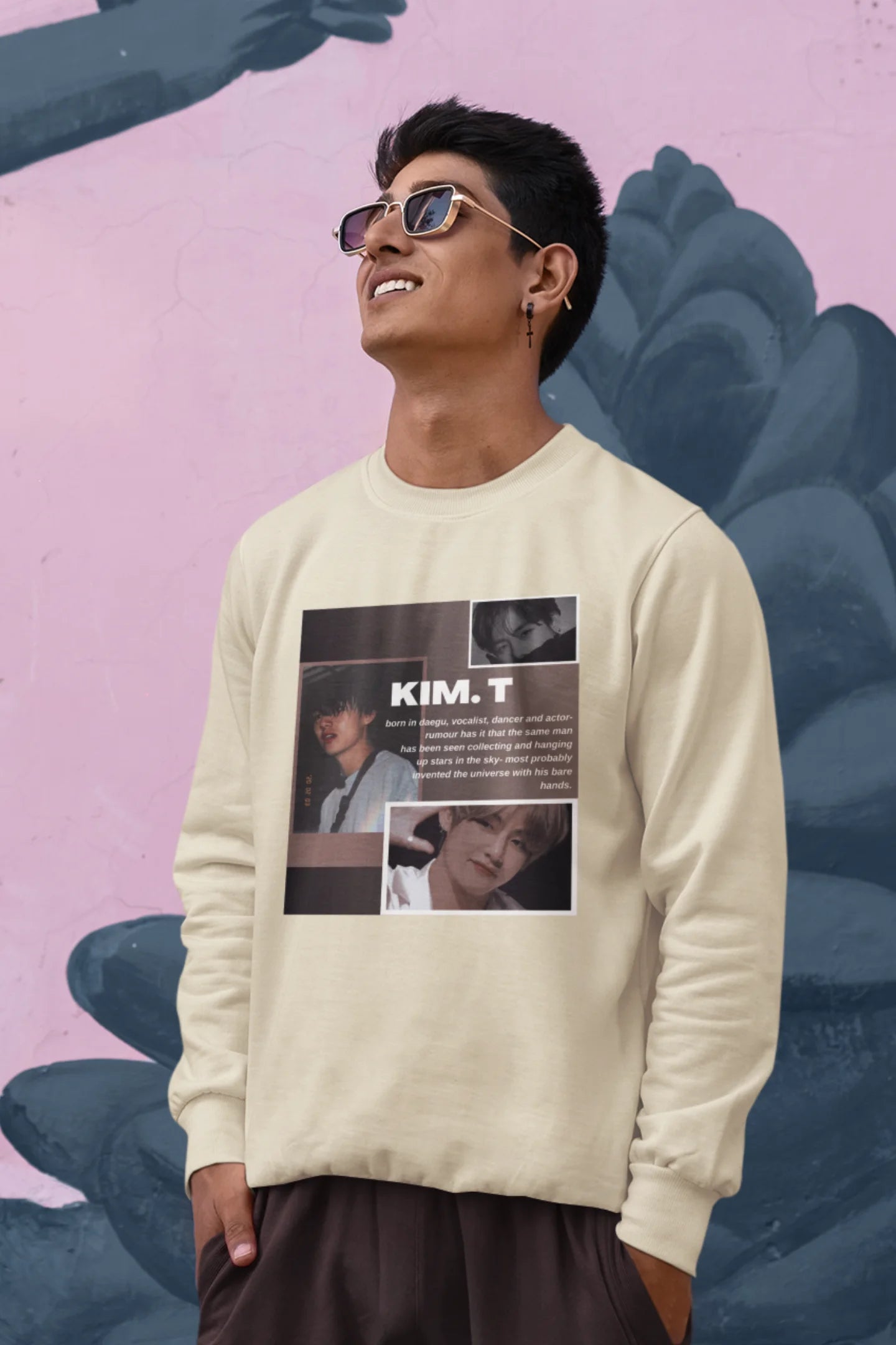Fourth front view of male model wearing a cream sweatshirt featuring a bold design inspired by BTS member Kim Taehyung (V). Ideal for BTS fans (ARMY) and K-Pop enthusiasts.