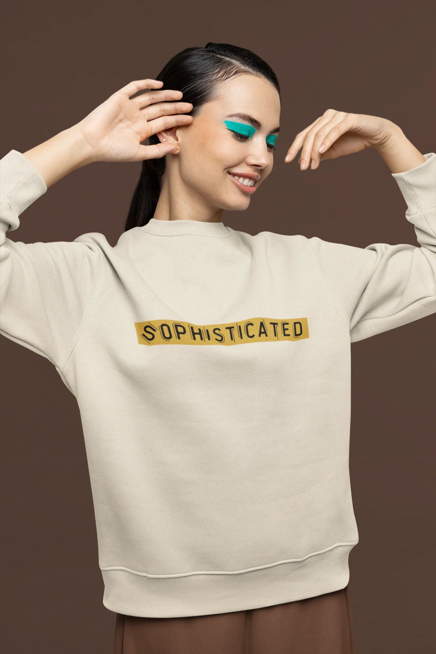First front view of a female model wearing a cream sweatshirt with a sophisticated brutalist design featuring a Greek god statue.
