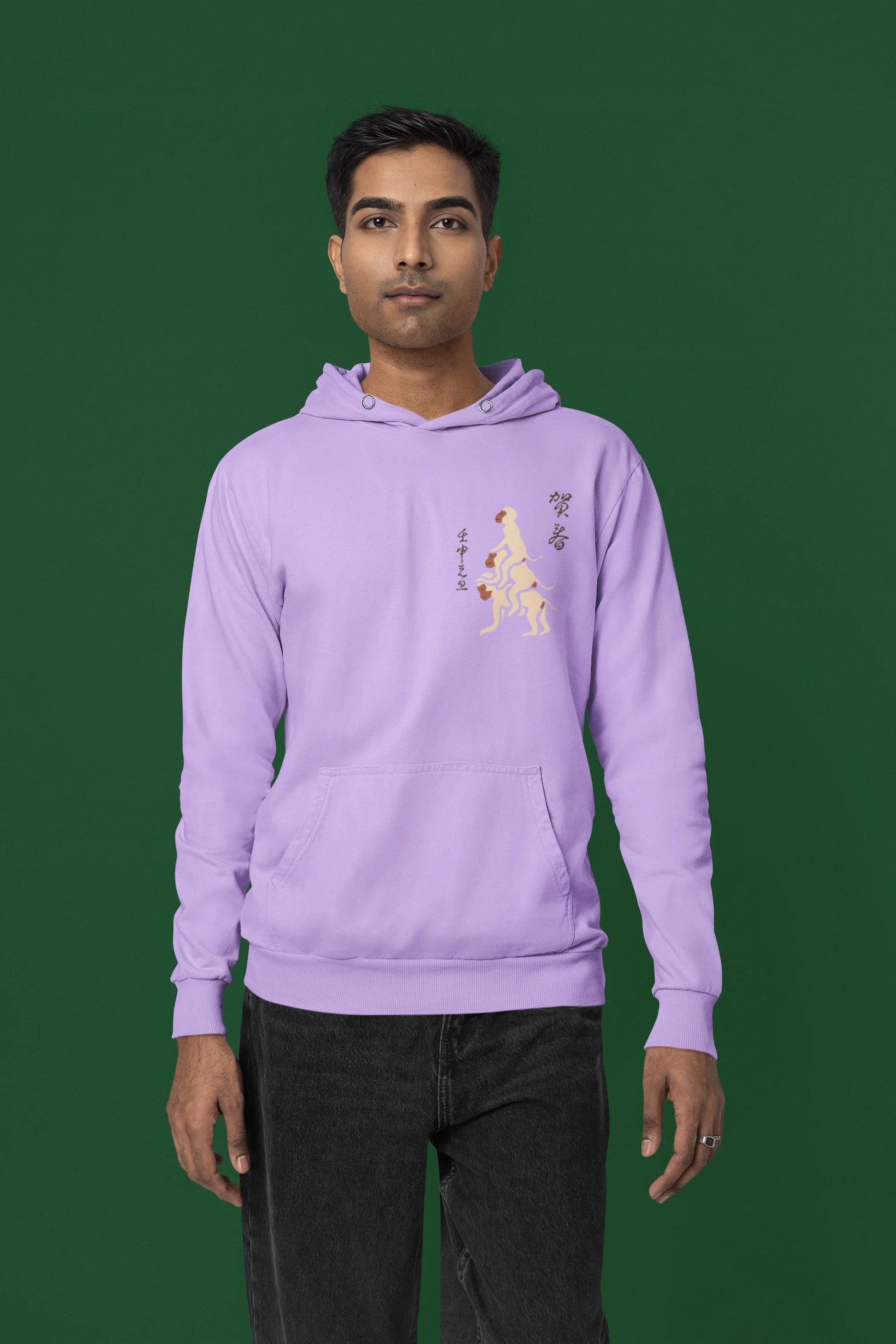 Fourth front view of a male model wearing a lavender hoodie with a design of the three wise monkeys: "See no evil, hear no evil, speak no evil."