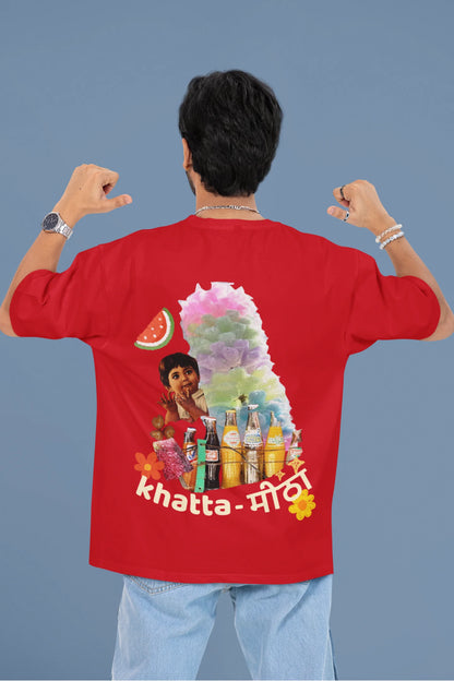 Back view of a male model wearing a red oversized t-shirt with a design representing "Bachpan" (childhood) and the concept of "Khatta Mitha" (sweet and sour).