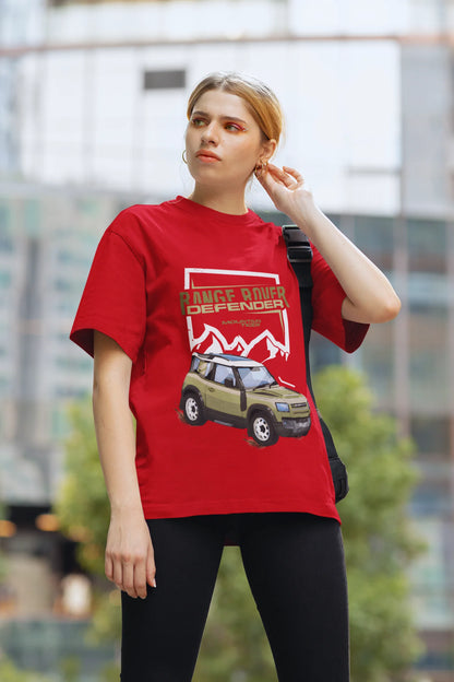 2nd front view of a female model wearing a red oversized t-shirt featuring a design of a Range Rover.
