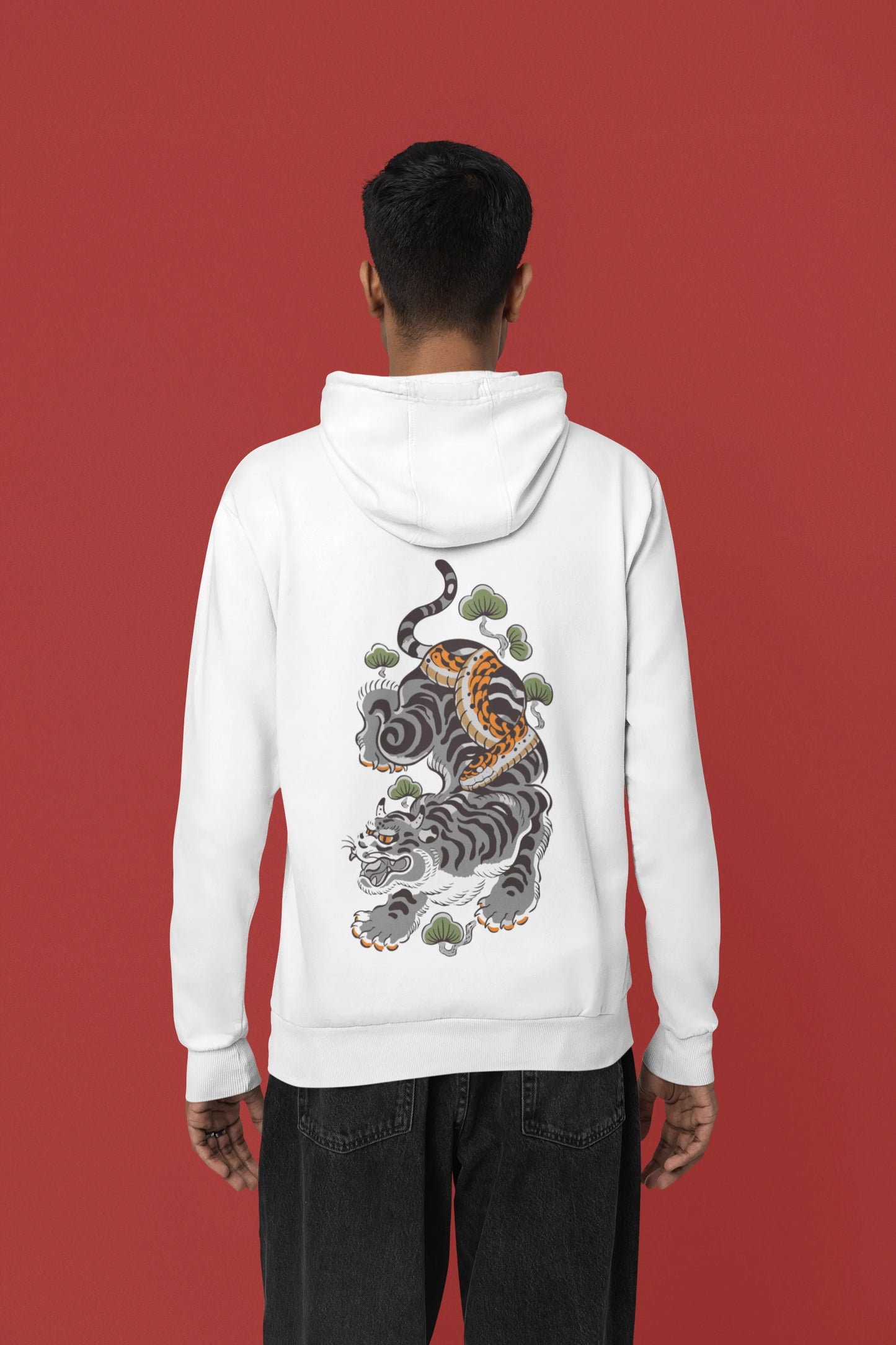 Back view of a male model wearing a white hoodie with a Japanese art style tiger design.