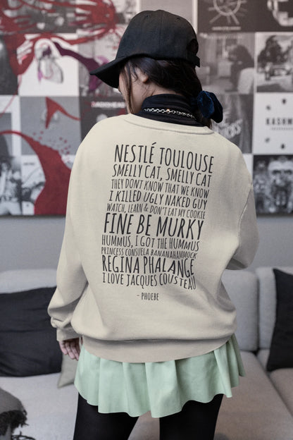 Back view of female model wearing a off-cream F.R.I.E.N.D.S. sweatshirt featuring a fun design inspired by Phoebe Buffay and her iconic quotes.