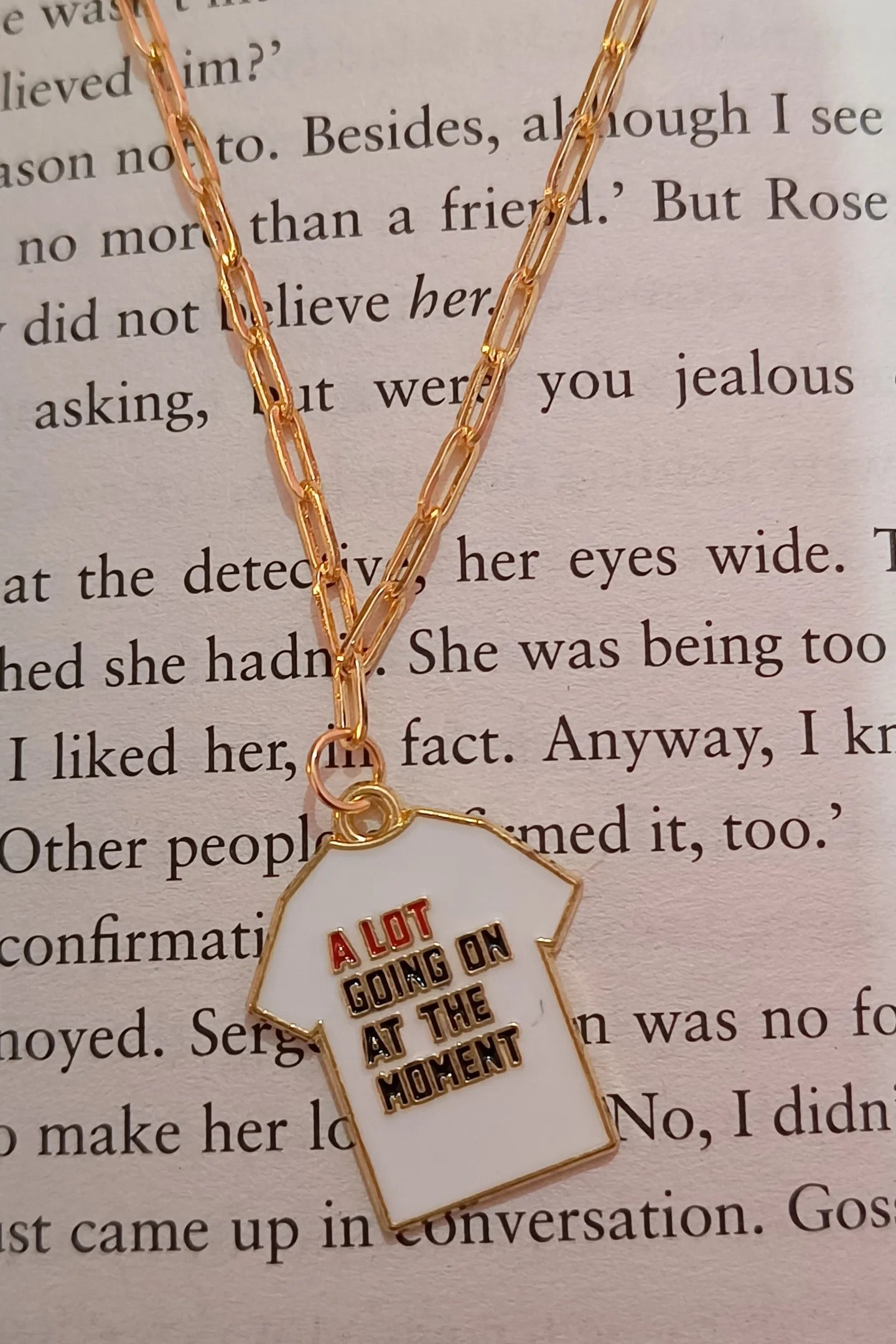 First image of an anti tarnish gold chain necklace featuring a design inspired by Taylor Swift's "Midnights" album perfect for any swiftie.