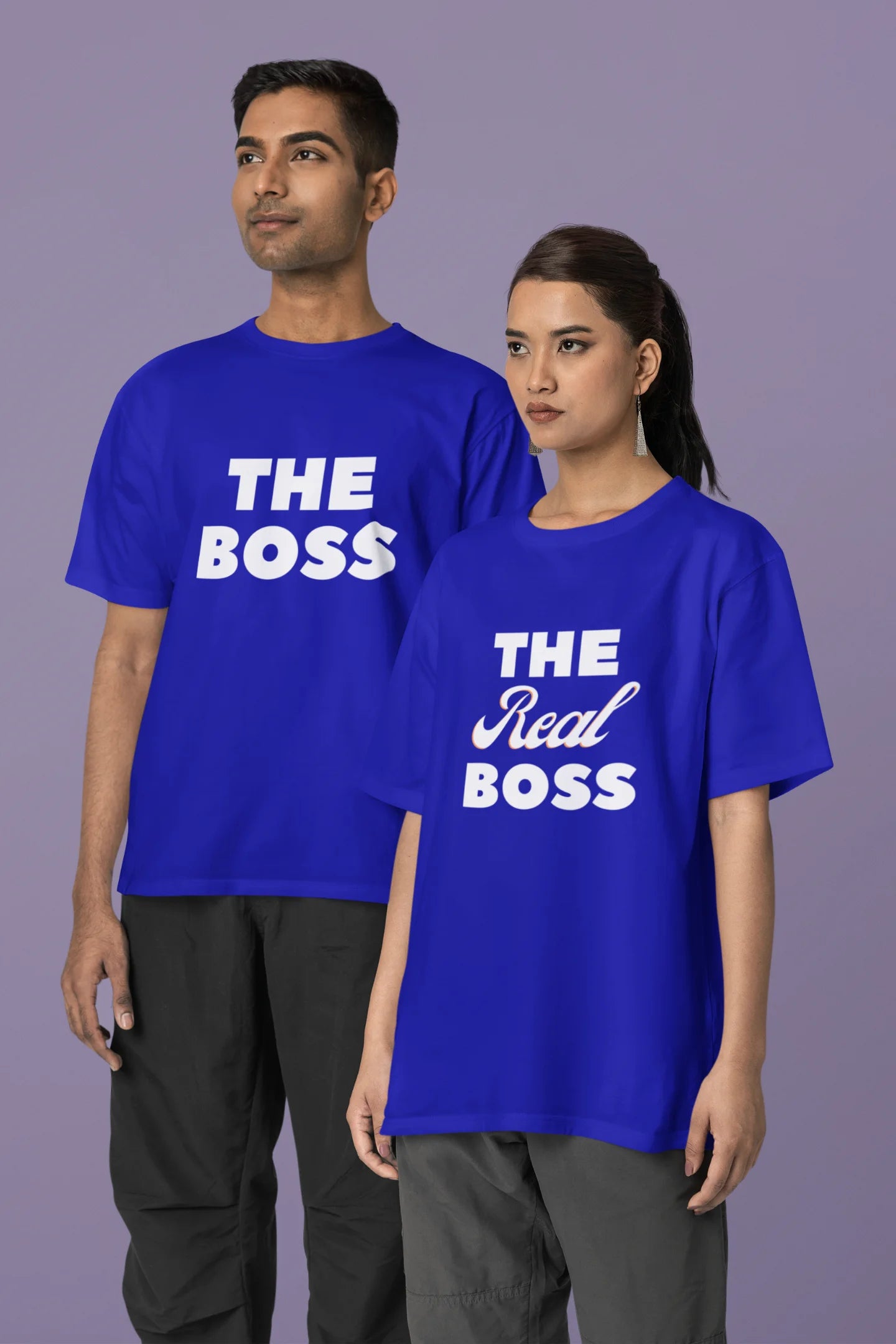 Third image of a smiling couple wearing royal blue oversized tees, one with "The Boss" and the other with "The Real Boss" printed on them.