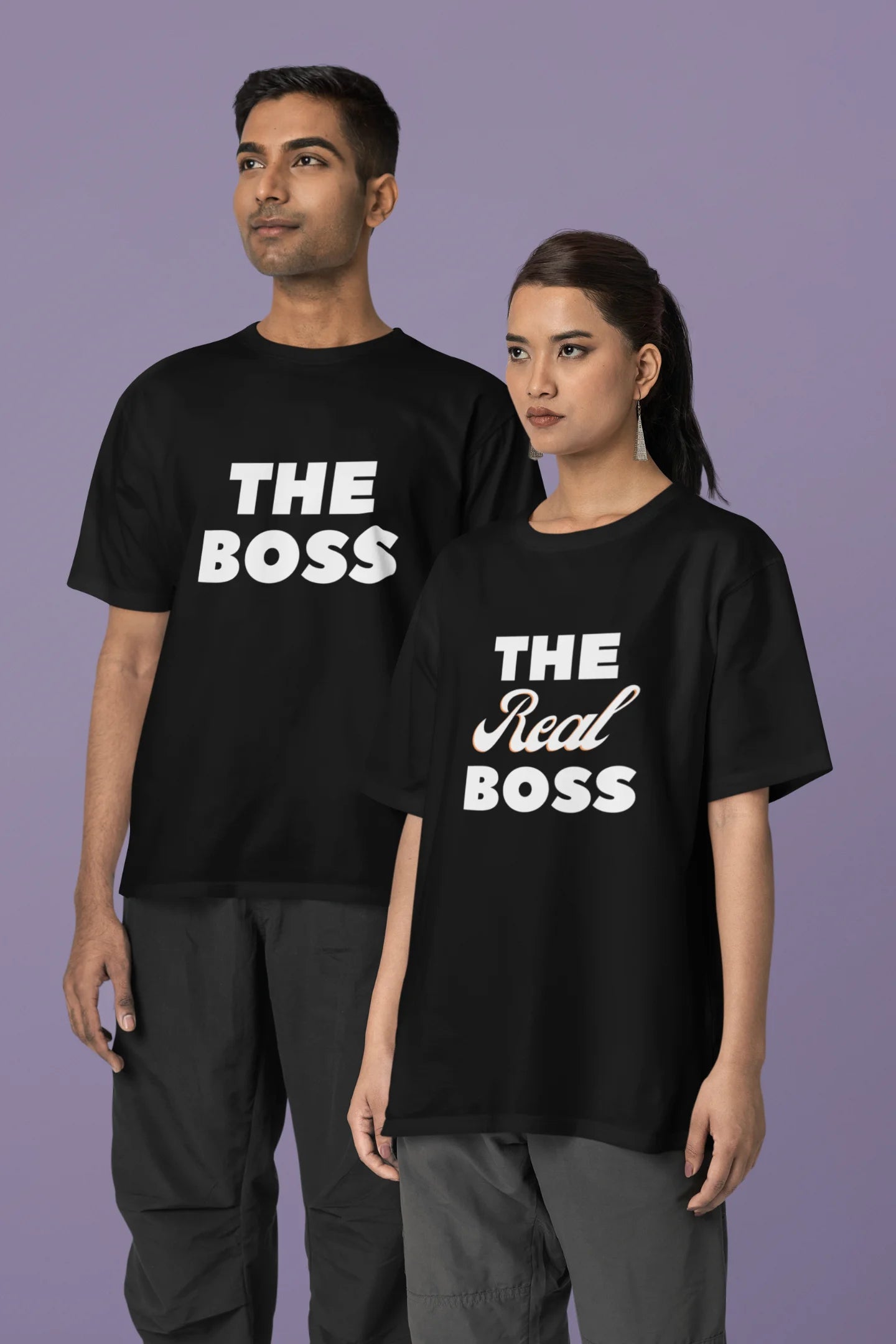 Third image of a smiling couple wearing matching black oversized tees, one with "The Boss" and the other with "The Real Boss" printed on them.