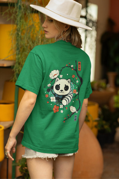Back view of a female model wearing a forest green oversized tee with a panda fox surrounded by bamboo.