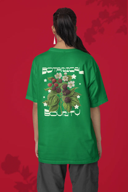 Back of a female model model wearing a forest green with a design featuring berry bushes overflowing with fruit, symbolizing the abundance and beauty of nature.