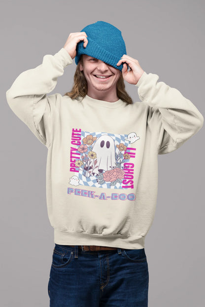 First front view of a male model wearing a trendy cream sweatshirt featuring a cute little ghost surrounded by flowers.