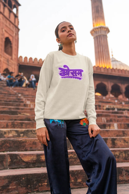 2nd front view of a female model wearing a cream colored oversized graphic t-shirt featuring the word "awesome" in a Hindi script.