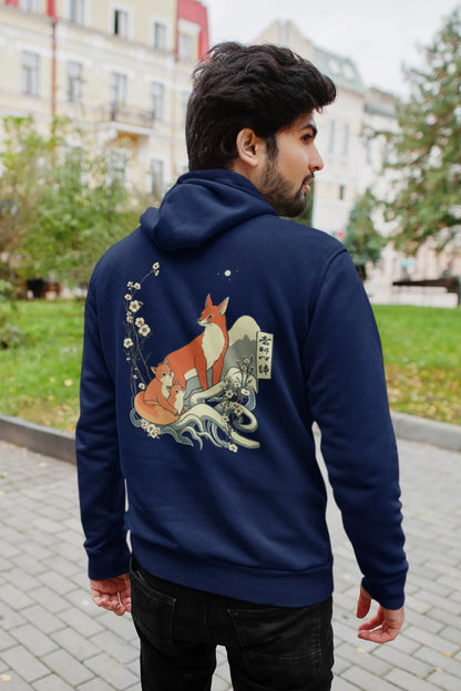 Back view male model wearing a navy blue hoodie with a design of a fox and its cub in a traditional Japanese landscape.