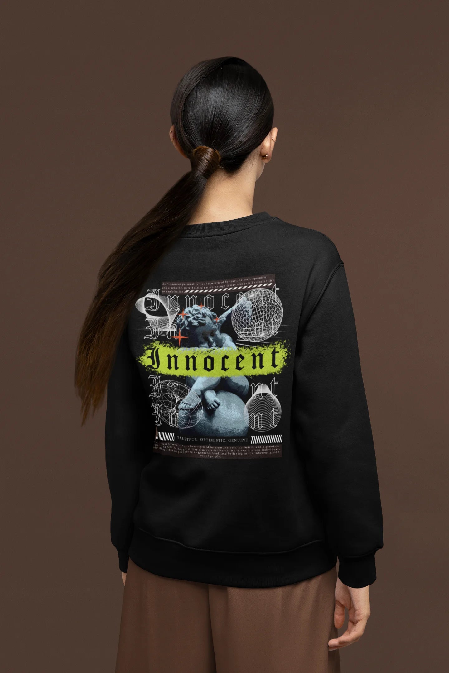 Back view of a female model wearing a black sweatshirt with a contrasting design of a cupid statue and brutalist elements.