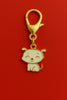 A keychain featuring a charm of Shero, the dog from Shinchan.