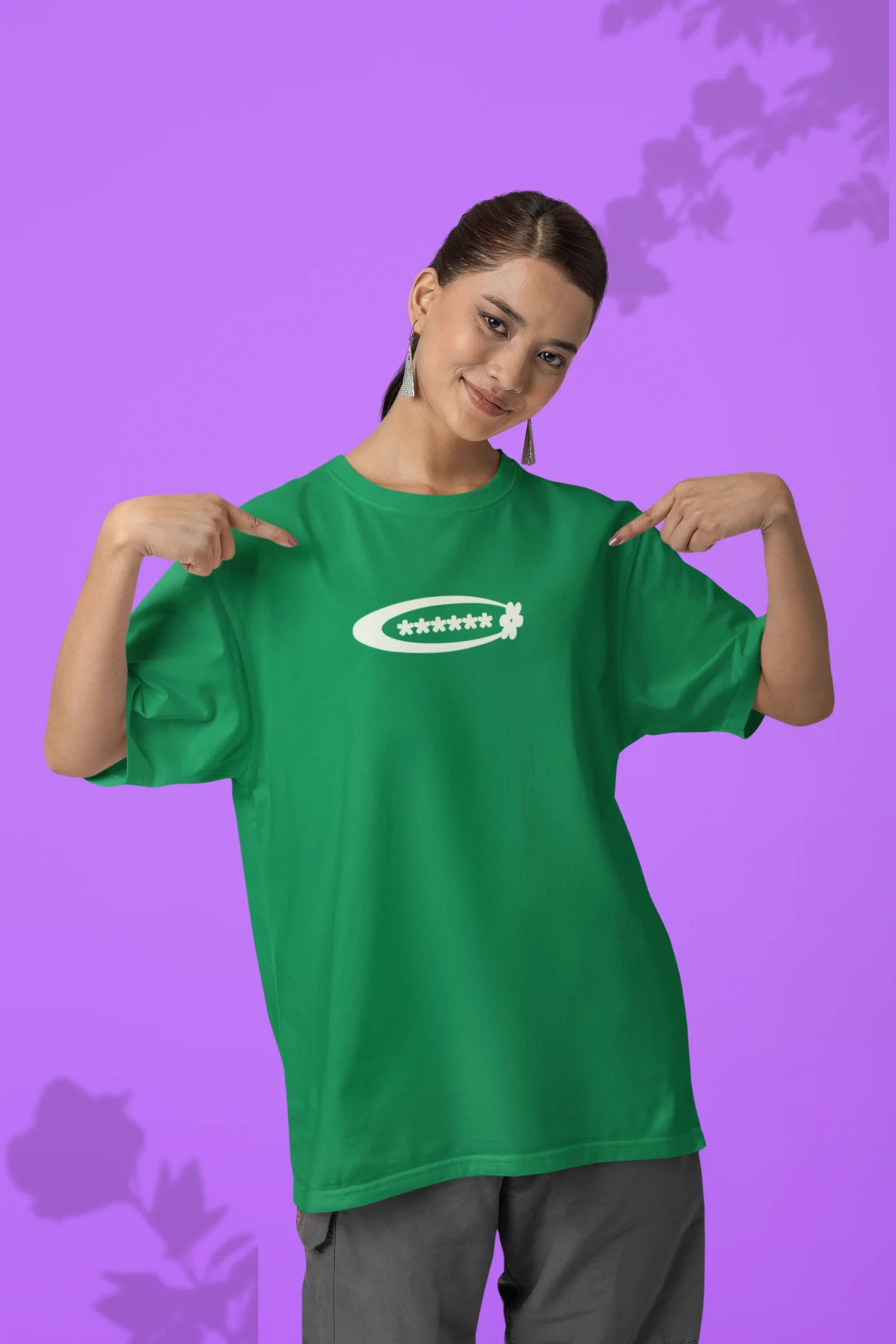 2nd front of a female model model wearing a forest green with a design featuring berry bushes overflowing with fruit, symbolizing the abundance and beauty of nature.