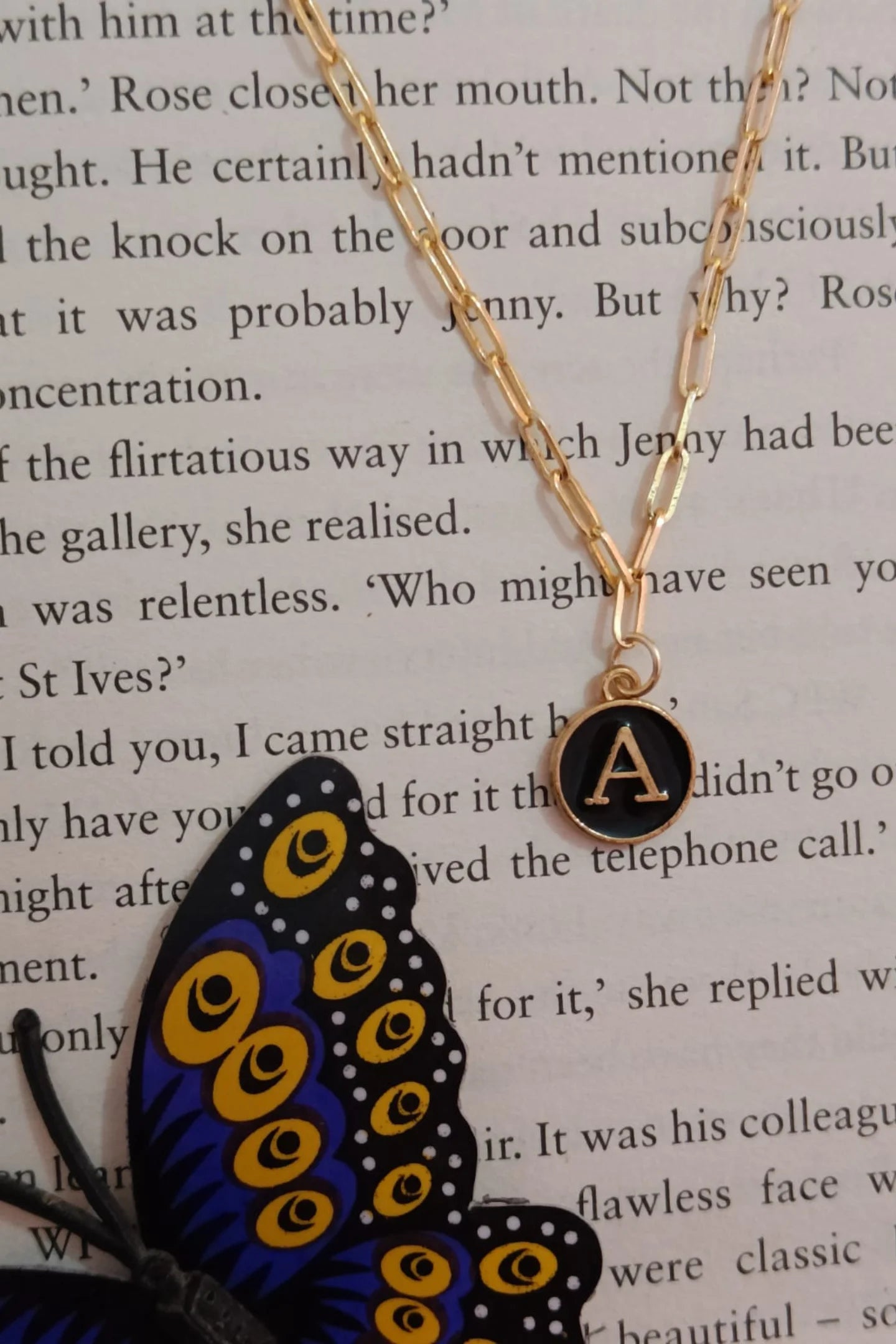 Third image of an anti tarnish gold chain necklace featuring personalized initials.